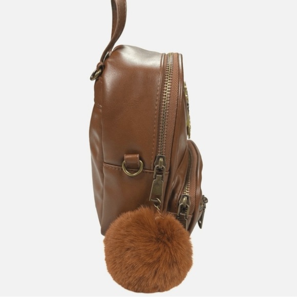 Brown Backpack with Emblem